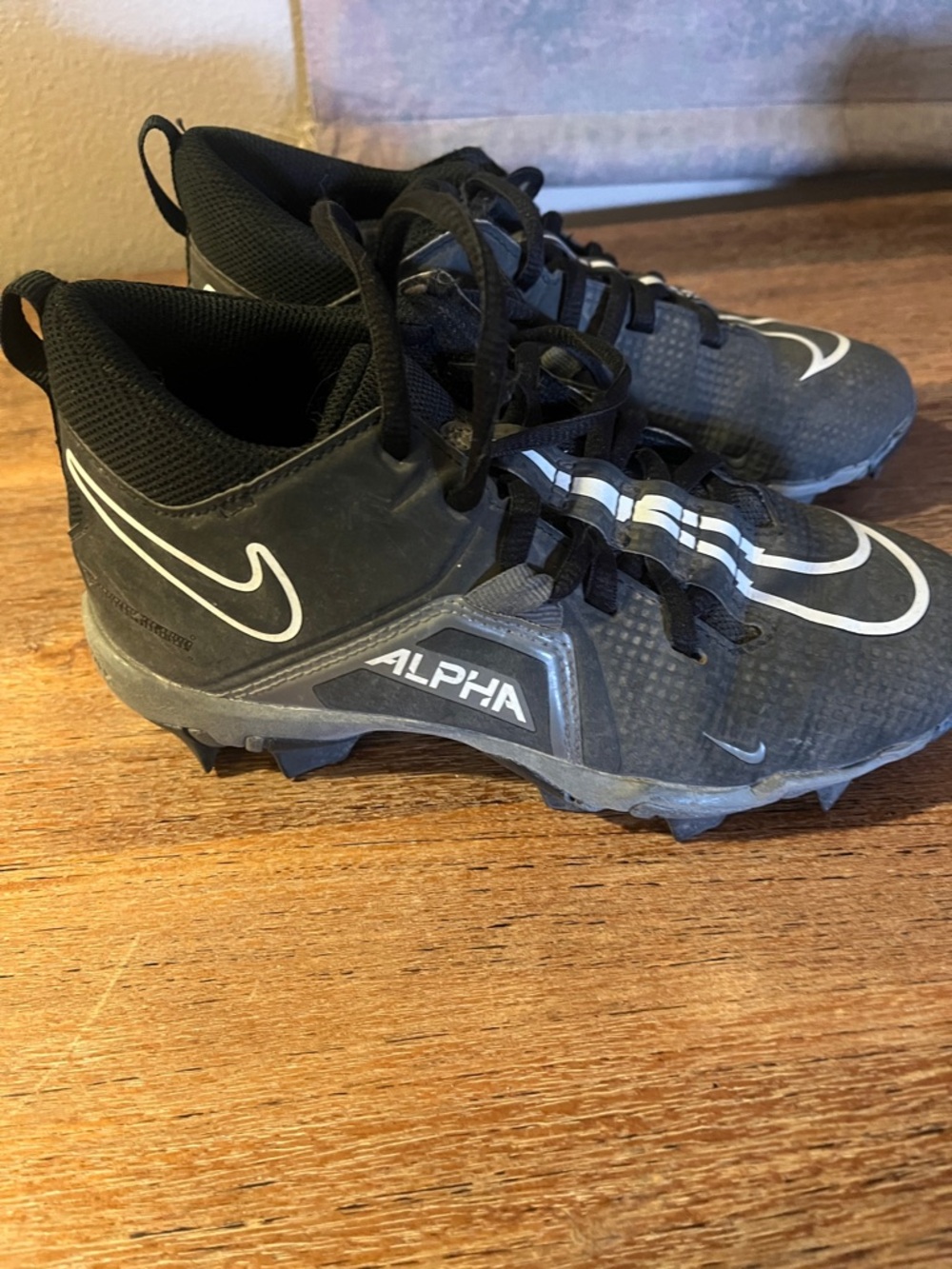 Nike Black and White Alpha Cleats